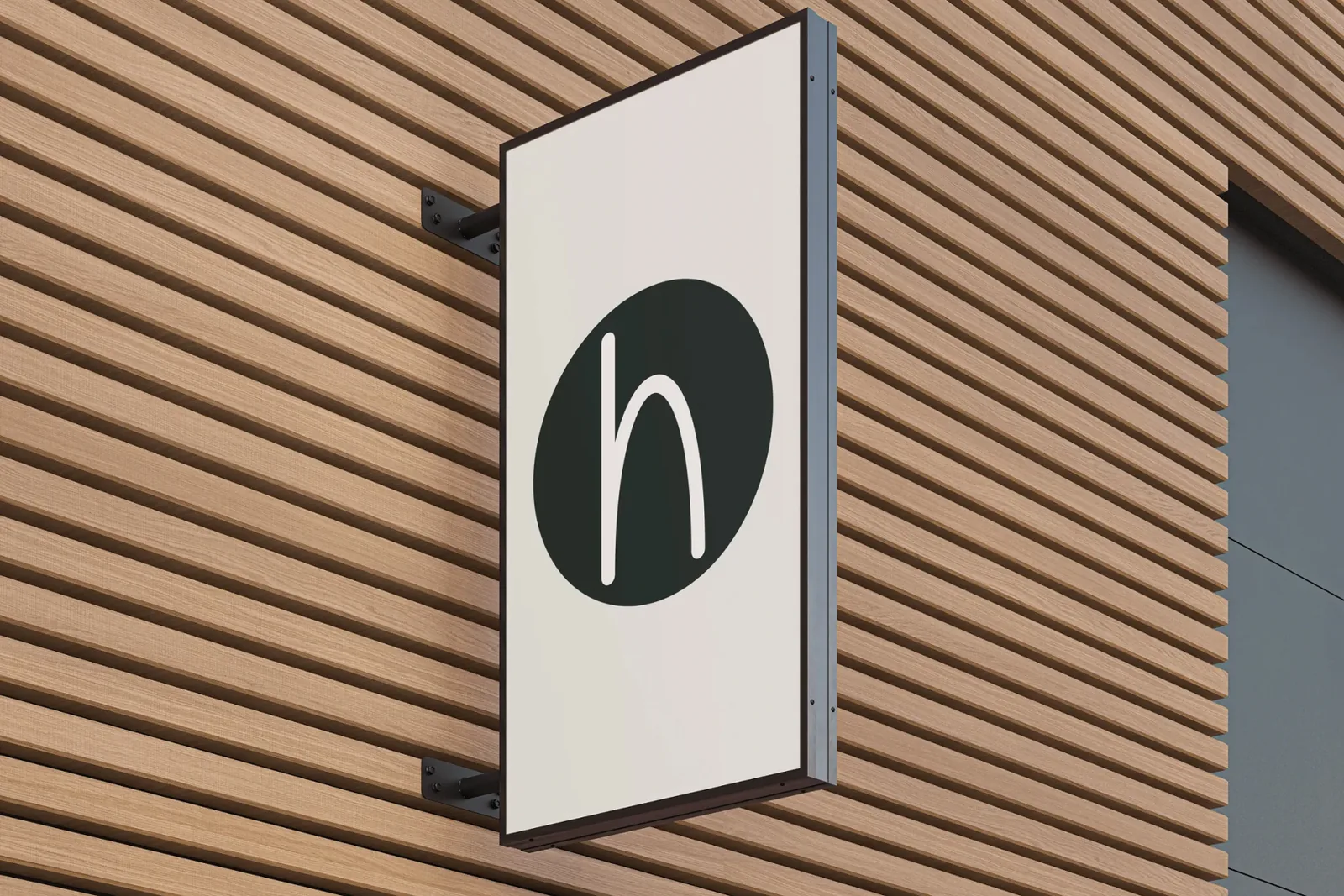 Rótulo de fachada con la «h» de Here